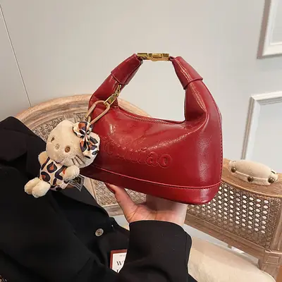 Black Leather Crossbody Bag with Cute Charm