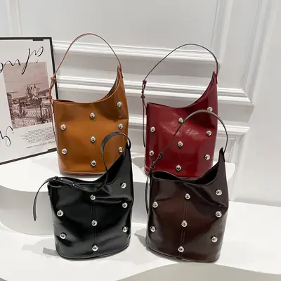 Women's Rivet Bucket Bag Brown Winter 2024