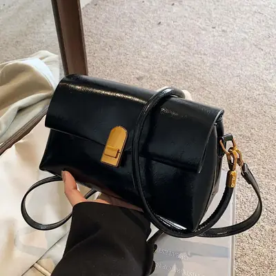 Women's Brown Leather Shoulder Bag with Gold Clasp