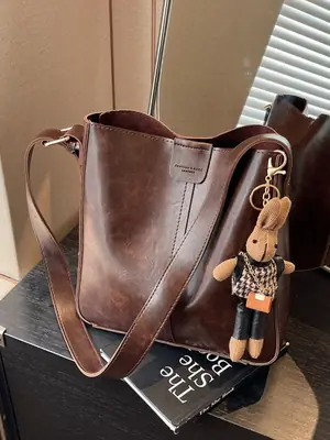 Women's Brown Leather Shoulder Bag with Cute Toy Charm
