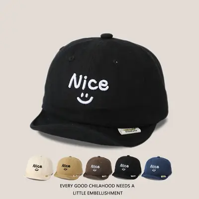 Brown Embroidered Baby Cap with Smile Design