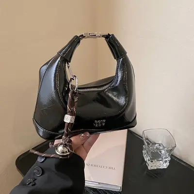 Black Leather Pea Bag with Gold Handle for Women