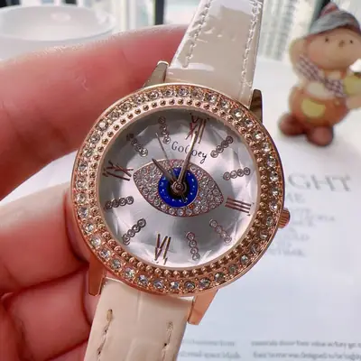 Luxury Women's Watch with Ruby Center & Crystal Ring