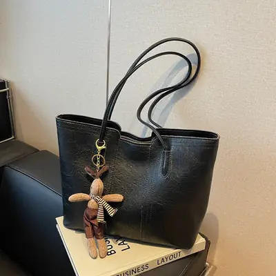 Women's Black Leather Shoulder Bag with Wooden Charm