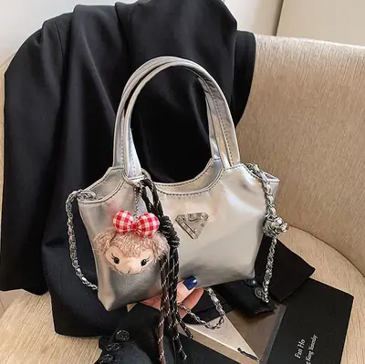 Women's Silver Chain Shoulder Bag with Cute Doll Design