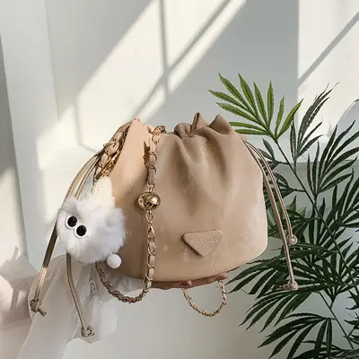 Women's Beige Faux Leather Bucket Bag with Gold Chain & Fur Pom