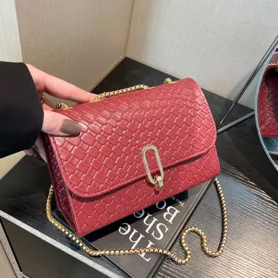 Trendy Woven Brown Shoulder Bag with Retro Lock