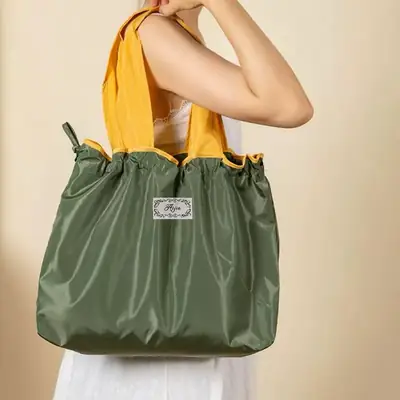 Green Drawstring Tote Bag with Yellow Handles