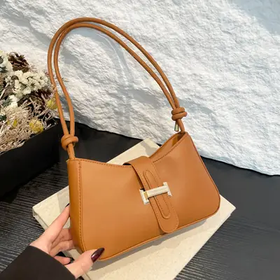 Women's Tan Crossbody Bag with Silver Clasp