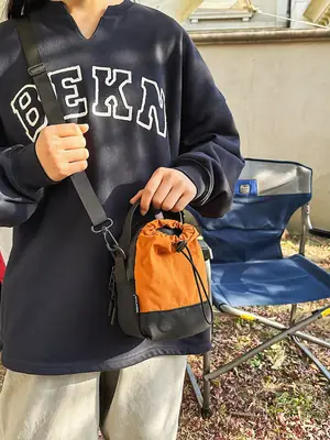 Men Orange Drawstring Phone Bag with Crossbody Strap