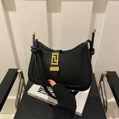 Black Vintage Women's Shoulder Bag with Gold Clasp