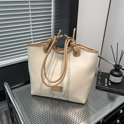 Women's Beige Straw Tote Bag with Leather Handles
