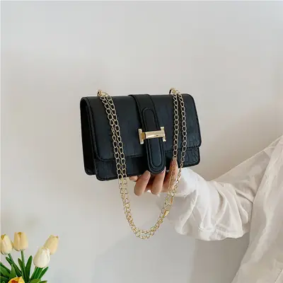 Women's Black Embossed Crossbody Bag with Chain Strap
