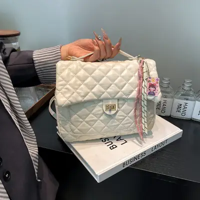 Women's Cream Quilted Shoulder Bag with Tassel & Chain