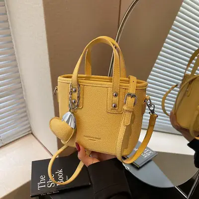 Women's Yellow Leather Bucket Bag with Heart Design