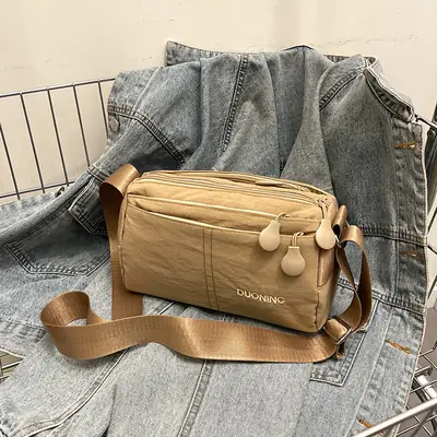 Women's Tan Crossbody Bag with Embellished Tassels