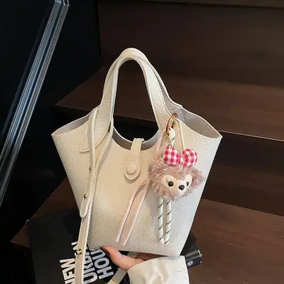 Women's Soft Leather Crossbody Bag with Cute Pom Pom Charm
