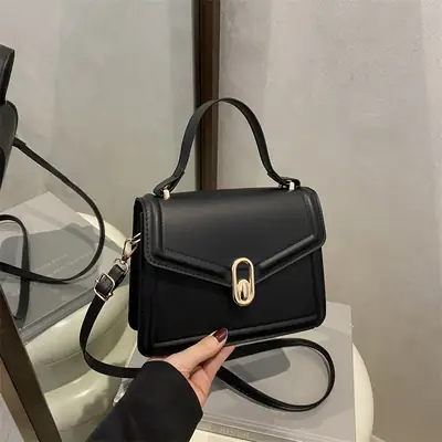 2025 Black Genuine Leather Crossbody Bag with Gold Clasp