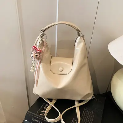 Women's Beige Leather Shoulder Bag with Unicorn Tassel