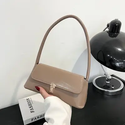 2025 Women's Beige Leather Armpit Bag with Clasp
