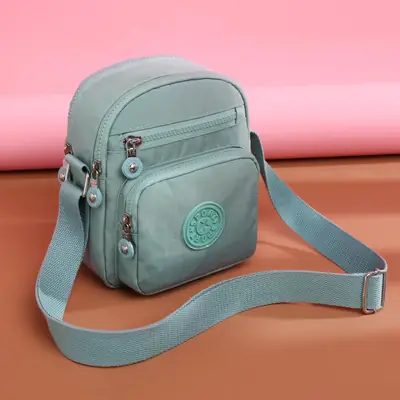 Women's Light Blue Crossbody Bag with Adjustable Strap