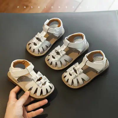 2025 New Summer Girls' Outer Wear Baotou Baby Toddler Shoes Soft Bottom Bow Girls' Princess Beach Shoes