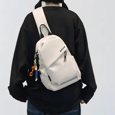 Men's White Crossbody Backpack with Colorful Accessories