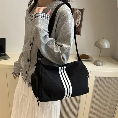 2025 Women's Black Crossbody Bag with 3 Stripes