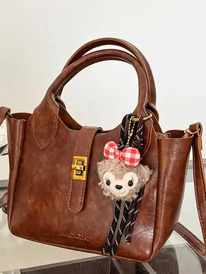 Women Pebbled Shoulder Crossbody Bag with Cute Charm
