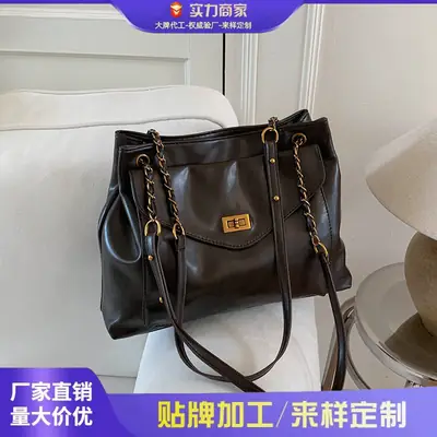 Black Leather Shoulder Bag with Gold Chain
